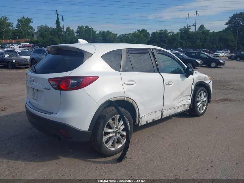 2014 Mazda Cx-5 VIN JM3KE4DY7E0321193 IAAI salvage auction — SIDE, Salvage Title, sold $3,250 on 2026-07-25 (photo 4)