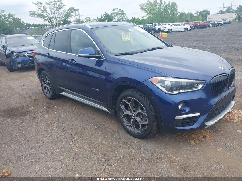 2017 BMW X1 VIN WBXHT3C36H5F80358 IAAI salvage auction — WATER/FLOOD, Mv-907A (New York), sold $6,000 on 2026-07-11 (photo 1)