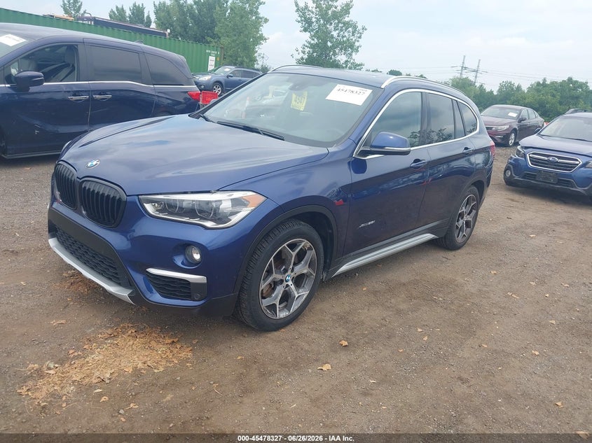 2017 BMW X1 VIN WBXHT3C36H5F80358 IAAI salvage auction — WATER/FLOOD, Mv-907A (New York), sold $6,000 on 2026-07-11 (photo 2)
