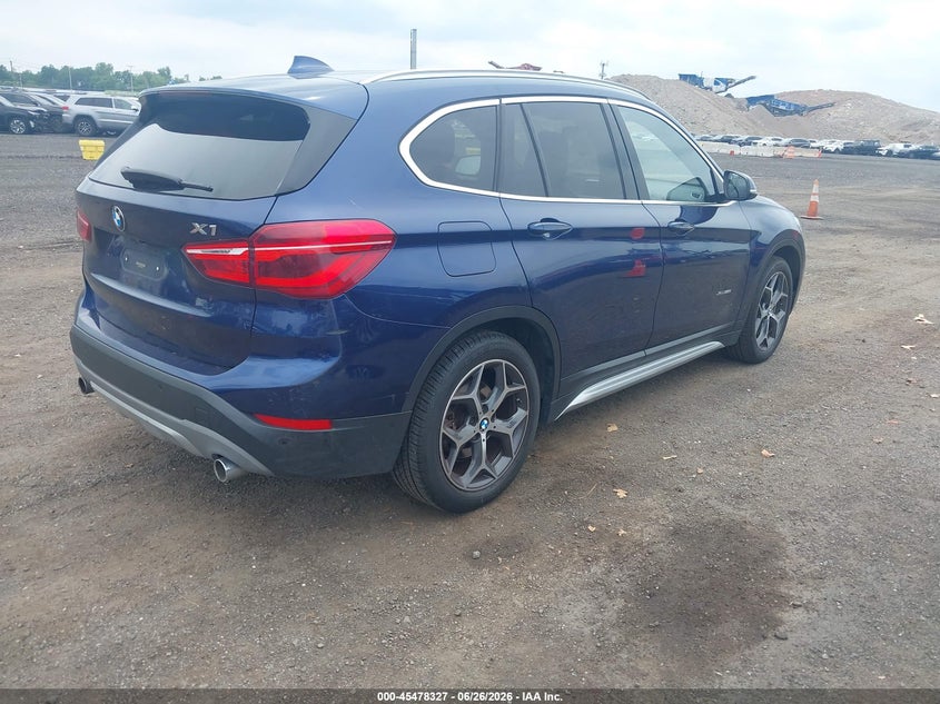 2017 BMW X1 VIN WBXHT3C36H5F80358 IAAI salvage auction — WATER/FLOOD, Mv-907A (New York), sold $6,000 on 2026-07-11 (photo 4)