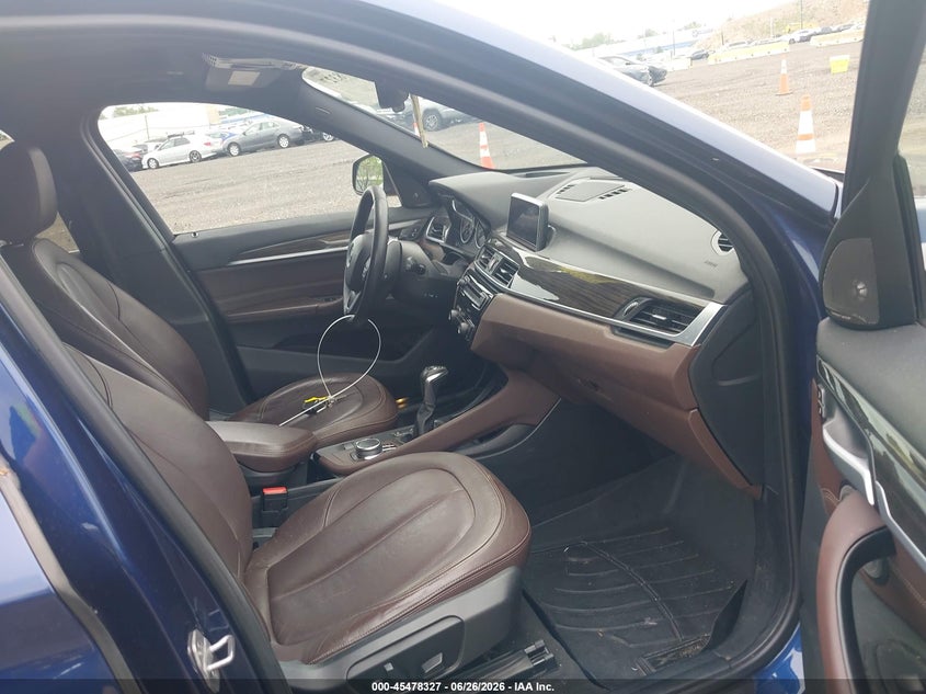 2017 BMW X1 VIN WBXHT3C36H5F80358 IAAI salvage auction — WATER/FLOOD, Mv-907A (New York), sold $6,000 on 2026-07-11 (photo 5)