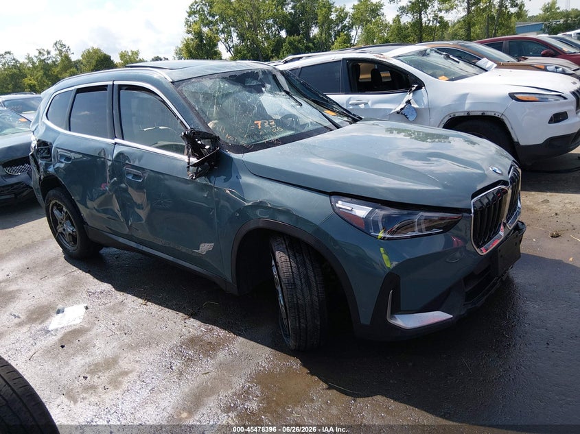 2023 BMW X1 VIN WBX73EF05P5W14536 IAAI salvage auction — ROLLOVER, Salvage Title, sold $1,300 on 2026-07-18 (photo 1)