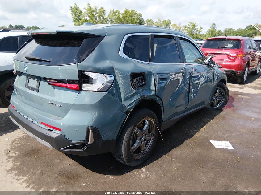 2023 BMW X1 VIN WBX73EF05P5W14536 IAAI salvage auction — ROLLOVER, Salvage Title, sold $1,300 on 2026-07-18 (photo 4)