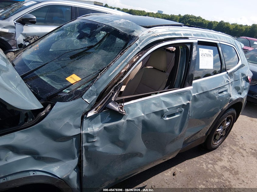 2023 BMW X1 VIN WBX73EF05P5W14536 IAAI salvage auction — ROLLOVER, Salvage Title, sold $1,300 on 2026-07-18 (photo 6)