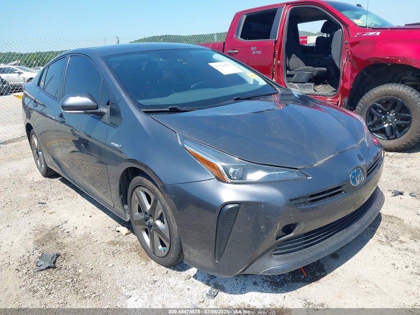 2021 Toyota Prius VIN JTDKAMFU1M3138691 — IAAI salvage auction photo