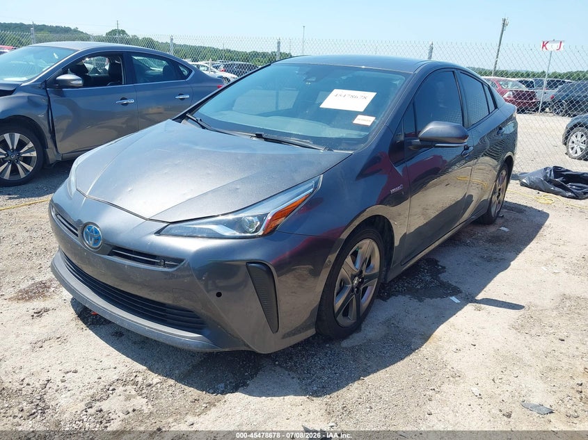 2021 Toyota Prius VIN JTDKAMFU1M3138691 IAAI salvage auction — HAIL, Salvage Title, sold $10,700 on 2026-08-20 (photo 2)