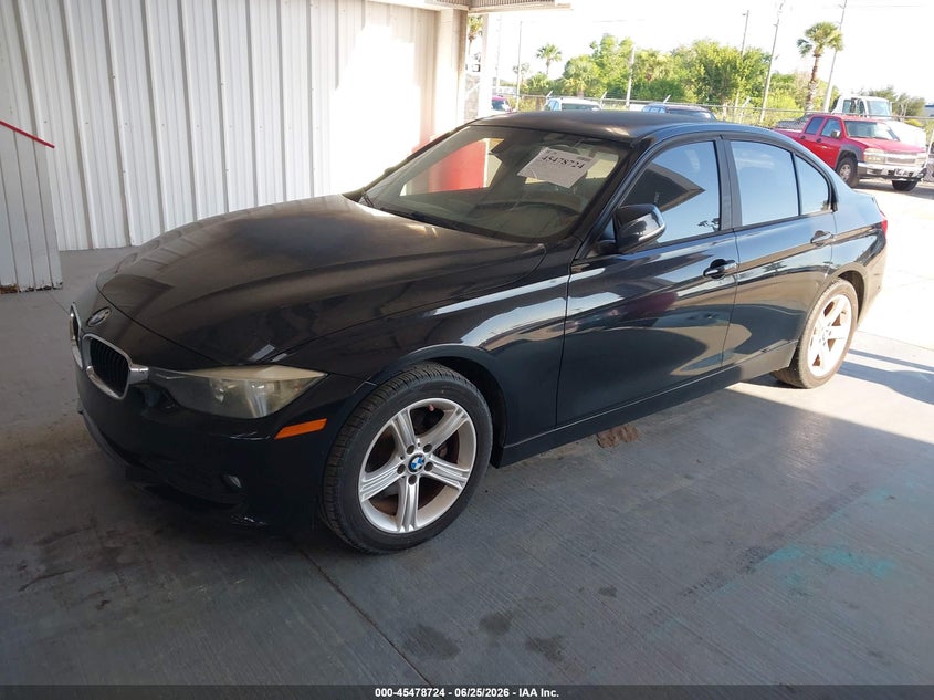 2014 BMW 3er VIN WBA3B1C56EPV79219 IAAI salvage auction — NORMAL WEAR, Clear (Florida), sold $1,475 on 2026-07-15 (photo 2)