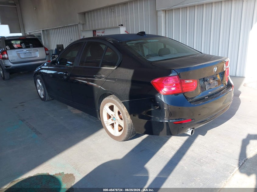 2014 BMW 3er VIN WBA3B1C56EPV79219 IAAI salvage auction — NORMAL WEAR, Clear (Florida), sold $1,475 on 2026-07-15 (photo 3)