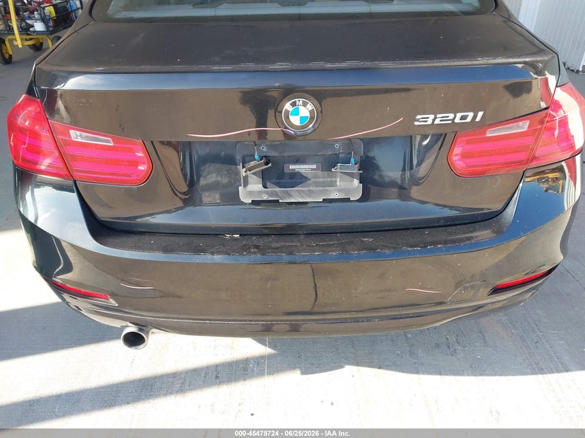 2014 BMW 3er VIN WBA3B1C56EPV79219 IAAI salvage auction — NORMAL WEAR, Clear (Florida), sold $1,475 on 2026-07-15 (photo 6)