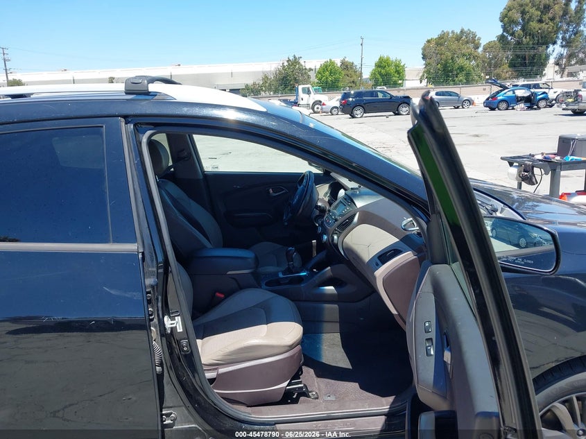 2014 Hyundai Tucson VIN KM8JUCAG2EU940737 IAAI salvage auction — THEFT, Salvage Title, sold $125 on 2026-07-29 (photo 5)