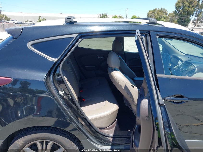 2014 Hyundai Tucson VIN KM8JUCAG2EU940737 IAAI salvage auction — THEFT, Salvage Title, sold $125 on 2026-07-29 (photo 8)