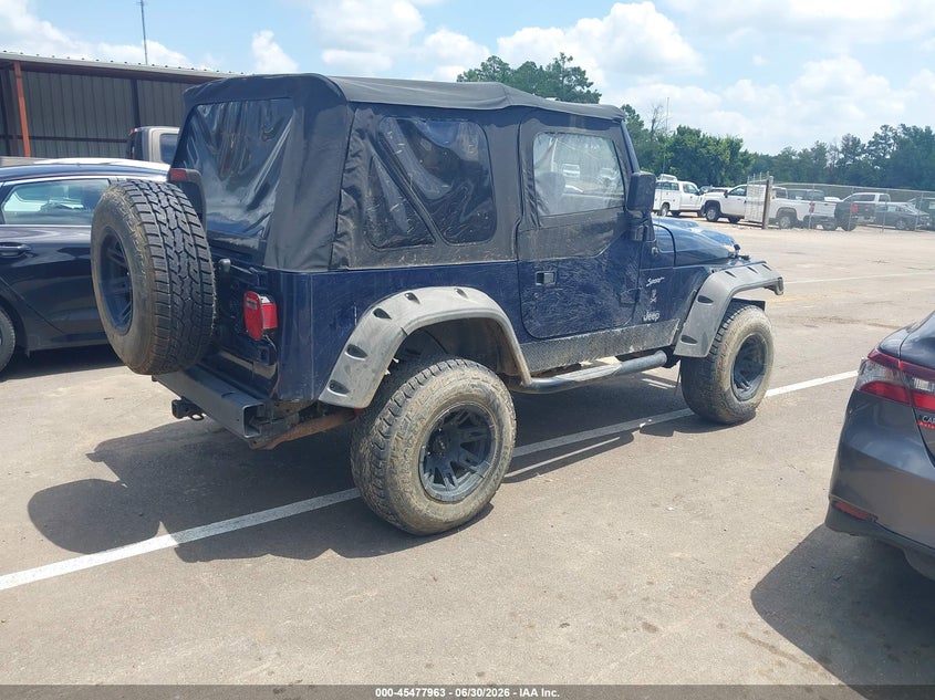 2002 Jeep Wrangler / VIN 1J4FA49S62P735914 IAAI salvage auction — RIGHT FRONT, Salvage (Mississippi), sold $1,400 on 2026-07-26 (photo 4)