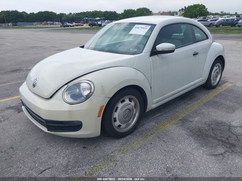2015 Volkswagen Beetle VIN 3VWF17AT3FM653675 IAAI salvage auction — NORMAL WEAR, Salvage (Florida), sold $3,150 on 2026-07-09 (photo 2)