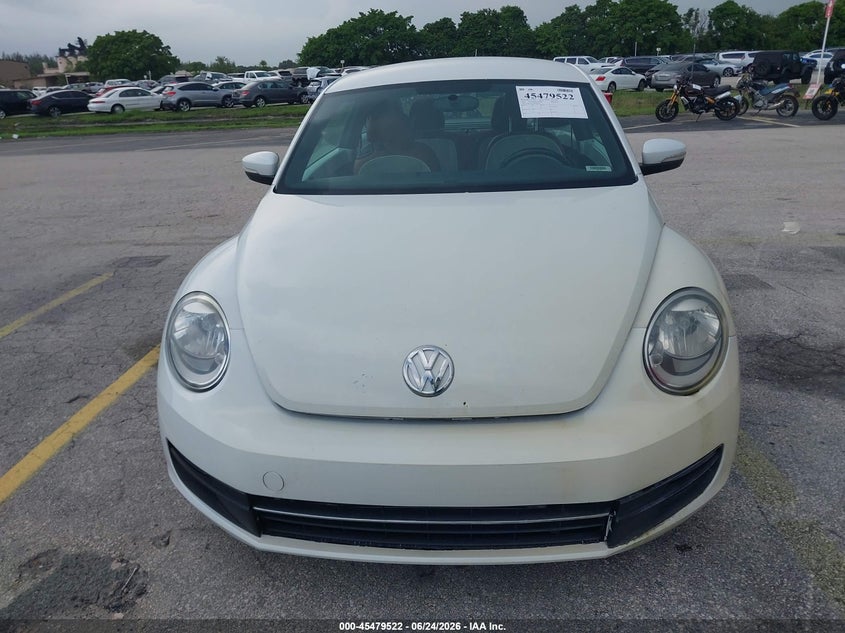 2015 Volkswagen Beetle VIN 3VWF17AT3FM653675 IAAI salvage auction — NORMAL WEAR, Salvage (Florida), sold $3,150 on 2026-07-09 (photo 6)