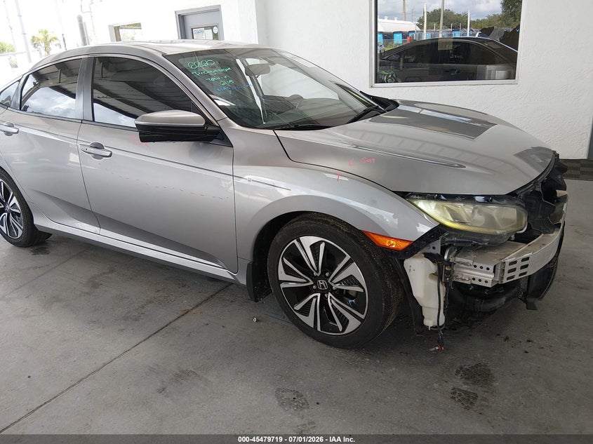 2016 Honda Civic VIN 19XFC1F34GE027468 IAAI salvage auction — FRONT END, Salvage Title, sold $2,175 on 2026-08-23 (photo 1)