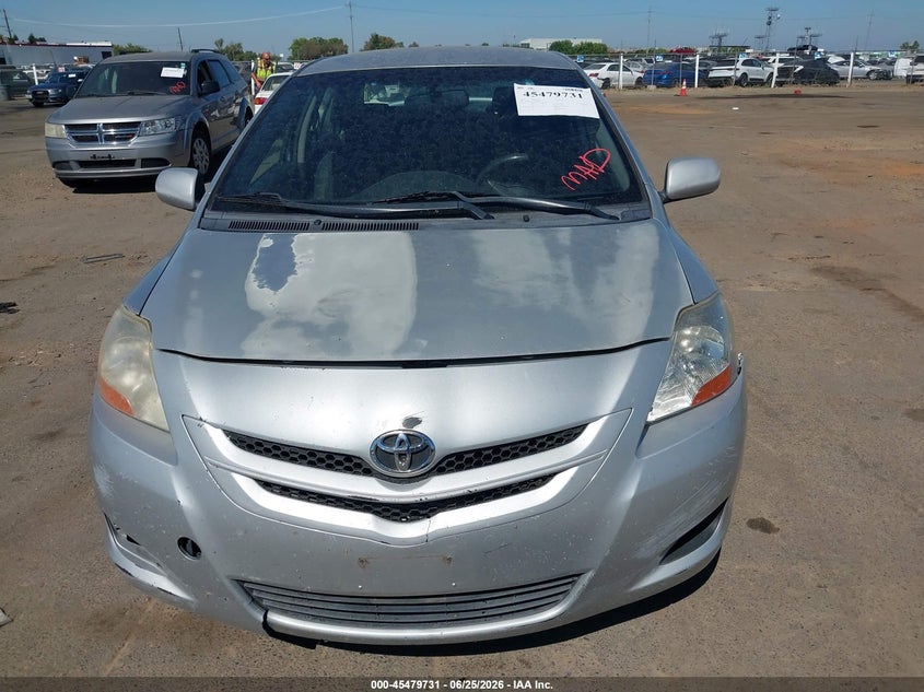 2007 Toyota Yaris VIN JTDBT923571042969 IAAI salvage auction — NORMAL WEAR, Salvage Title, sold $550 on 2026-07-22 (photo 6)