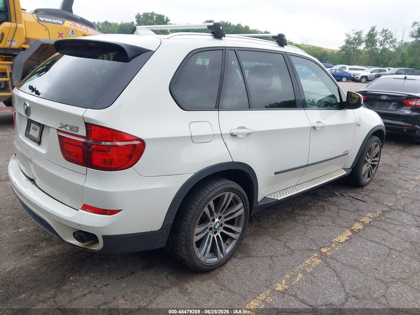 2012 BMW X5 VIN 5UXZW0C59CL666546 IAAI salvage auction — NORMAL WEAR, Clear (Michigan), sold $2,050 on 2026-07-27 (photo 4)