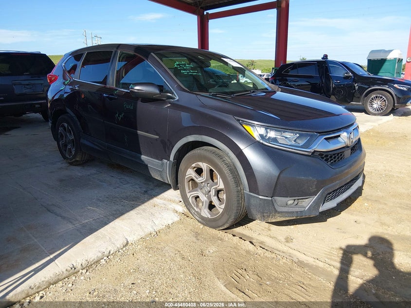 2018 Honda Cr-v VIN 7FARW1H85JE056271 IAAI salvage auction — SIDE, Rebuildable (Florida), sold $4,550 on 2026-07-10 (photo 1)