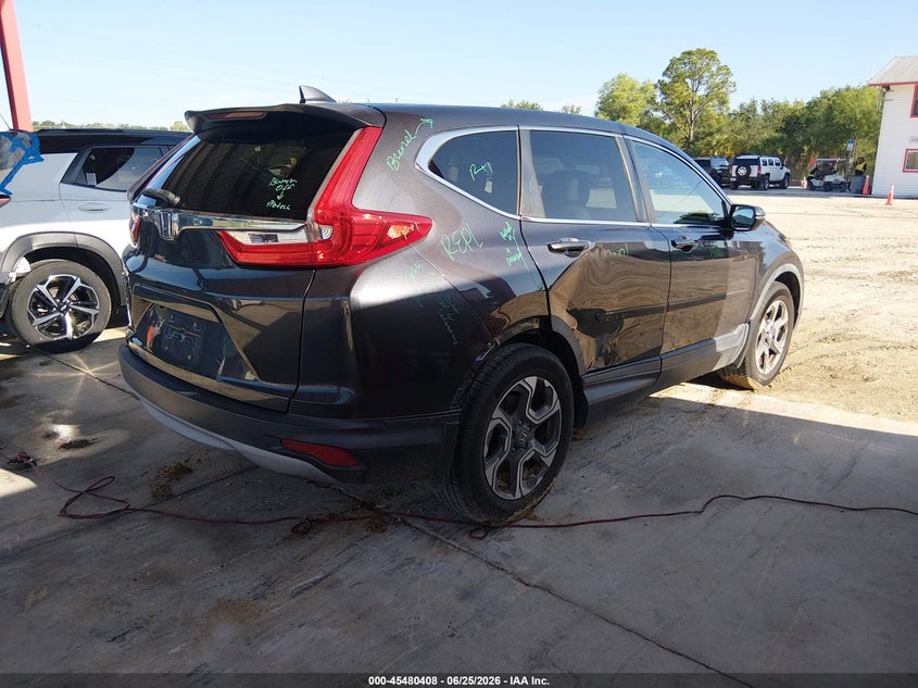 2018 Honda Cr-v VIN 7FARW1H85JE056271 IAAI salvage auction — SIDE, Rebuildable (Florida), sold $4,550 on 2026-07-10 (photo 4)