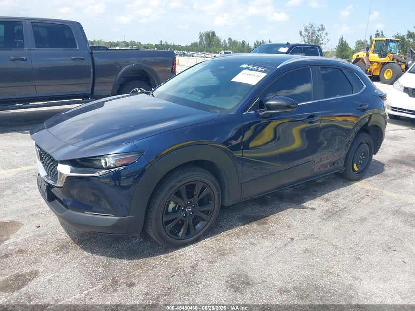 2024 Mazda Cx-30 VIN 3MVDMBBM1RM698127 IAAI salvage auction — LEFT SIDE, Enterprise Vehicles Clear Only (Texas), sold $12,200 on 2026-07-16 (photo 2)