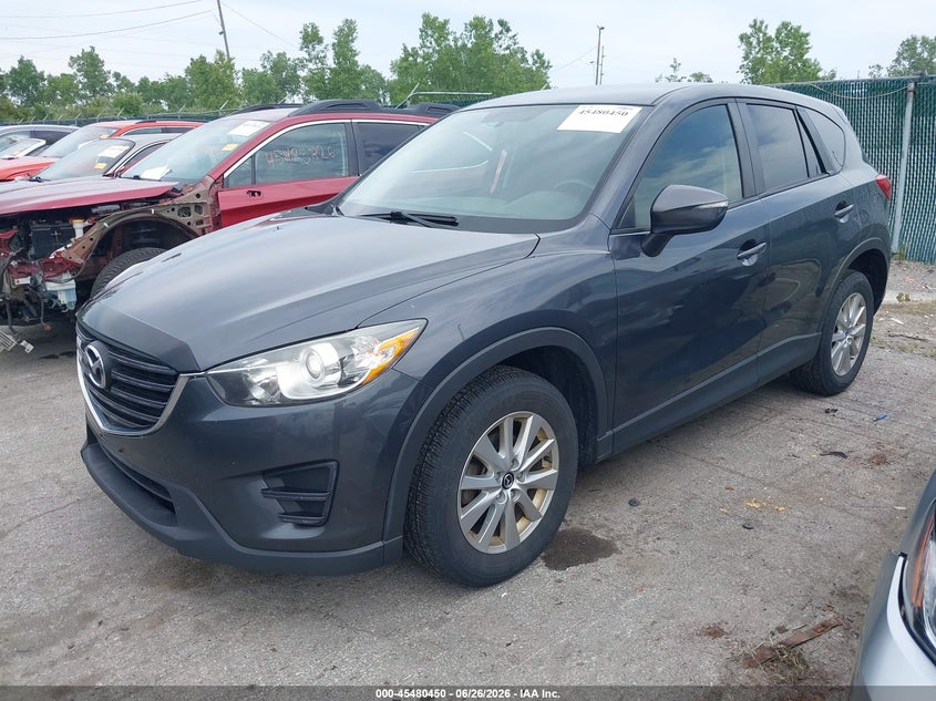 2016 Mazda Cx-5 VIN JM3KE4BY6G0758768 IAAI salvage auction — SIDE, Wait Title, sold $1,950 on 2026-08-20 (photo 2)