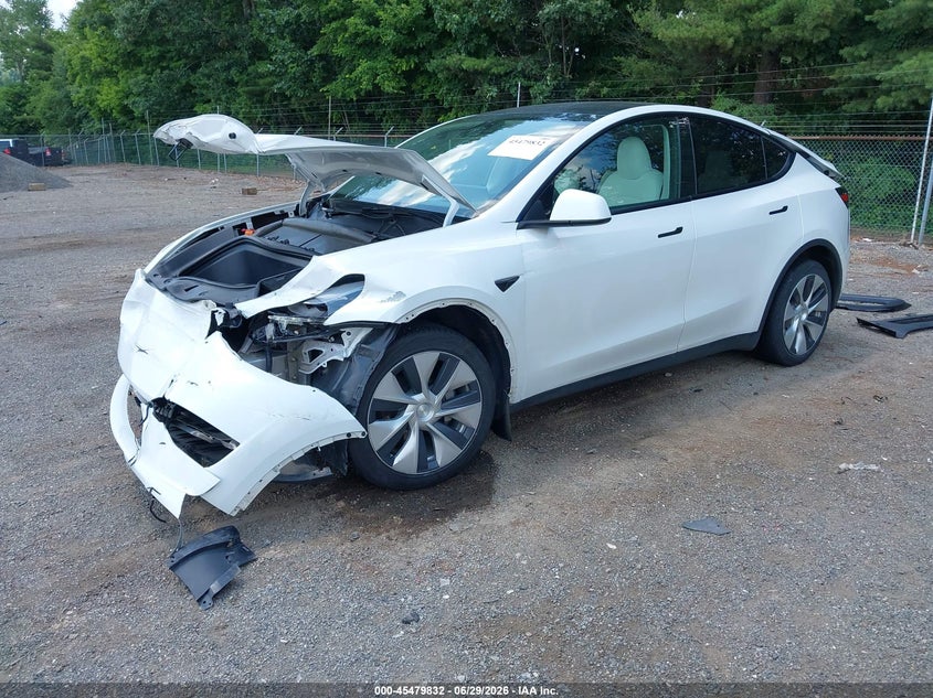 2023 Tesla Model y VIN 7SAYGDEE8PF697202 IAAI salvage auction — FRONT END, Salvage (Ohio), sold $7,300 on 2026-07-09 (photo 2)