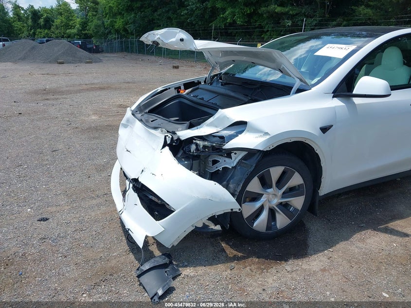 2023 Tesla Model y VIN 7SAYGDEE8PF697202 IAAI salvage auction — FRONT END, Salvage (Ohio), sold $7,300 on 2026-07-09 (photo 6)