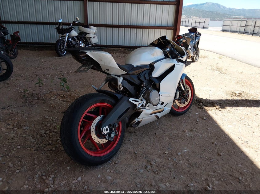 2015 Ducati Panigale VIN ZDM14BUW9FB025063 IAAI salvage auction — SIDE, Salvage (Utah), sold $2,700 on 2026-07-16 (photo 4)