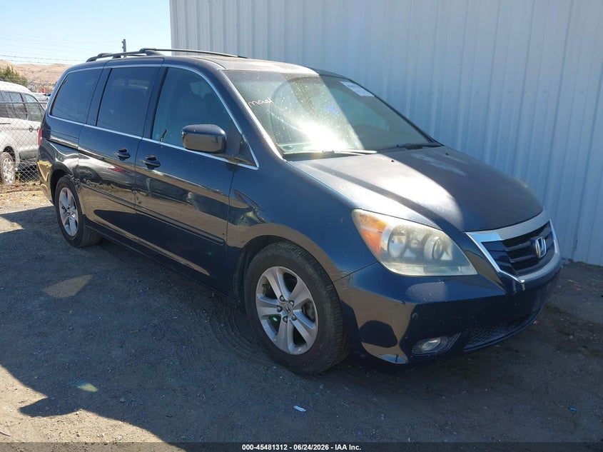 2010 Honda Odyssey VIN 5FNRL3H98AB005260 IAAI salvage auction — SIDE, Salvage (California), sold $1,150 on 2026-07-09 (photo 1)