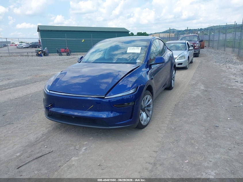 2026 Tesla Model y VIN 7SAYGDEE4TF392600 IAAI salvage auction — REAR END, Salvage Title, sold $16,800 on 2026-07-23 (photo 2)