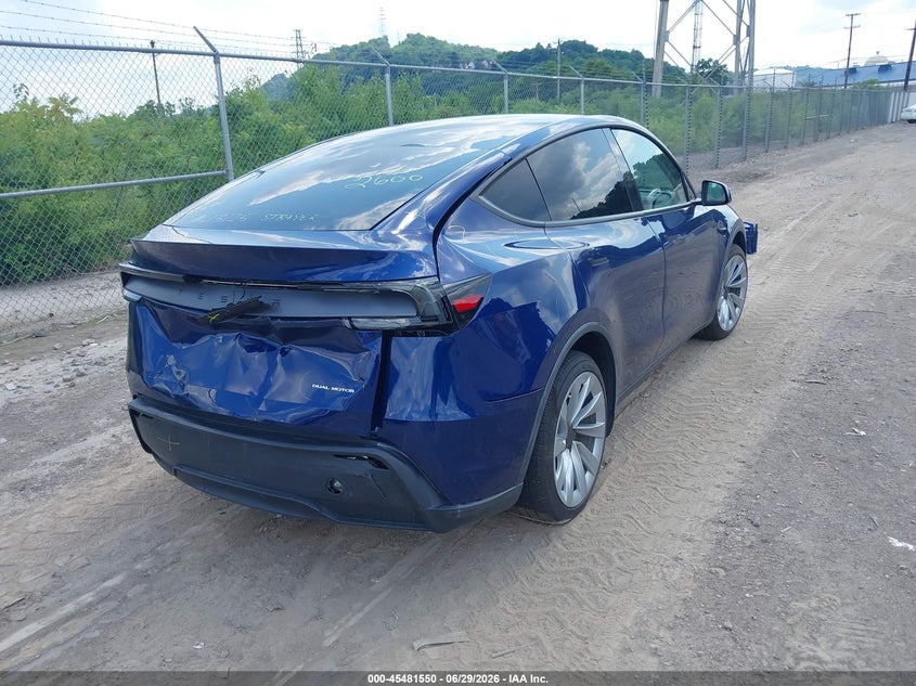 2026 Tesla Model y VIN 7SAYGDEE4TF392600 IAAI salvage auction — REAR END, Salvage Title, sold $16,800 on 2026-07-23 (photo 4)