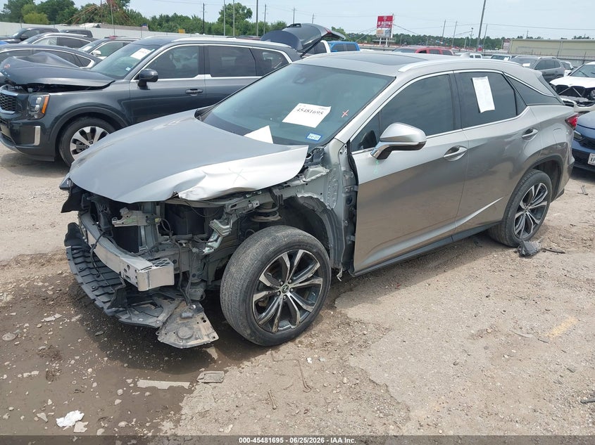 2022 Lexus Rx VIN 2T2HZMAA2NC242210 IAAI salvage auction — FRONT END, Original (Texas), sold $13,000 on 2026-07-29 (photo 2)