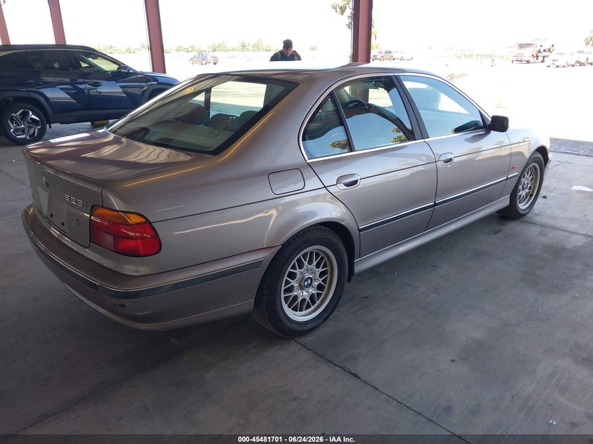 1999 BMW 5 series VIN WBADM634XXGU02713 IAAI salvage auction — NORMAL WEAR, Clear - Dealer Only (California), sold $375 on 2026-07-21 (photo 4)