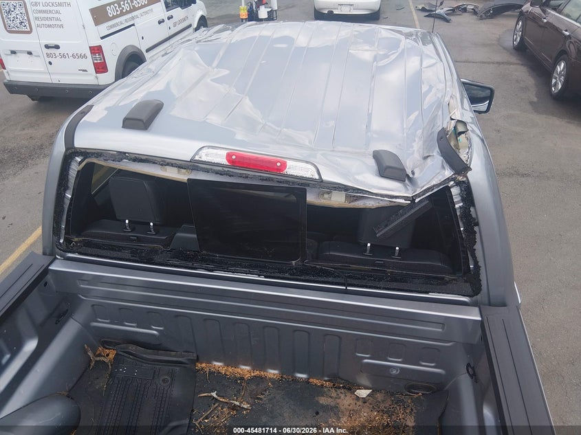 2023 Ford F-150 VIN 1FTFW1E85PKF55098 IAAI salvage auction — STORM DAMAGE, Salvage (South Carolina), sold $15,300 on 2026-07-26 (photo 6)