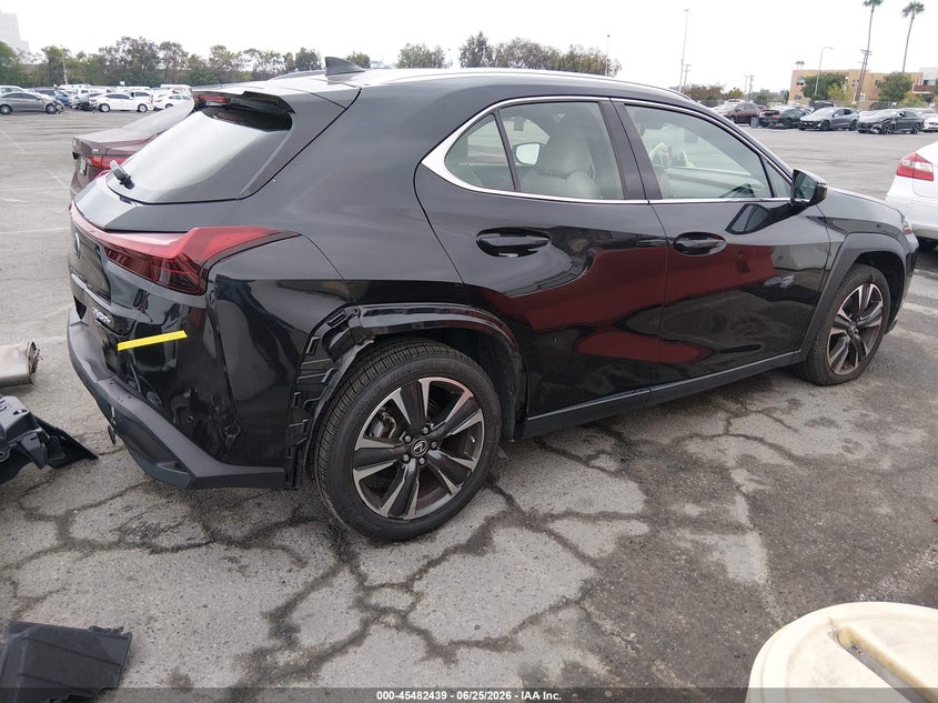 2023 Lexus Ux VIN JTHX6JBH2P2145351 IAAI salvage auction — REAR END, Salvage (California), sold $12,000 on 2026-07-05 (photo 4)