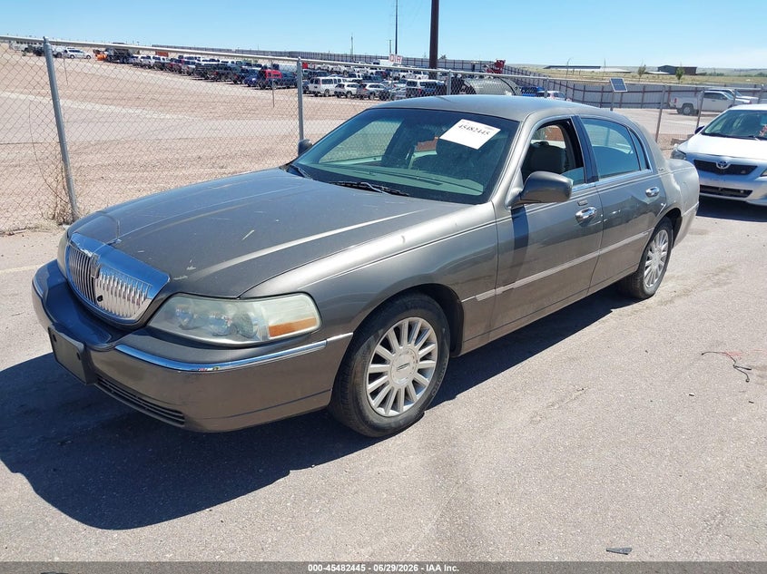 2003 Lincoln TOWN CAR VIN 1LNHM81W43Y704549 IAAI salvage auction — SIDE, Clear (Kansas), sold $25 on 2026-07-08 (photo 2)