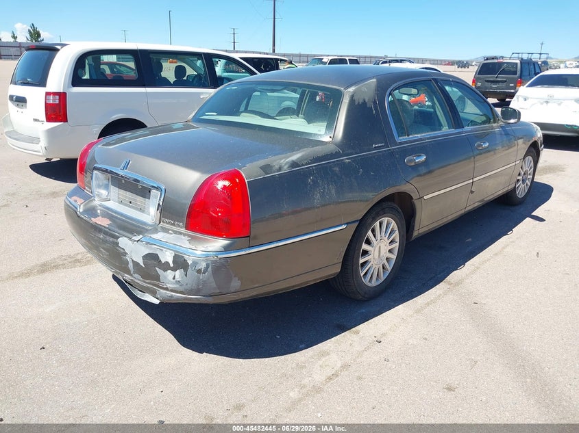 2003 Lincoln TOWN CAR VIN 1LNHM81W43Y704549 IAAI salvage auction — SIDE, Clear (Kansas), sold $25 on 2026-07-08 (photo 4)