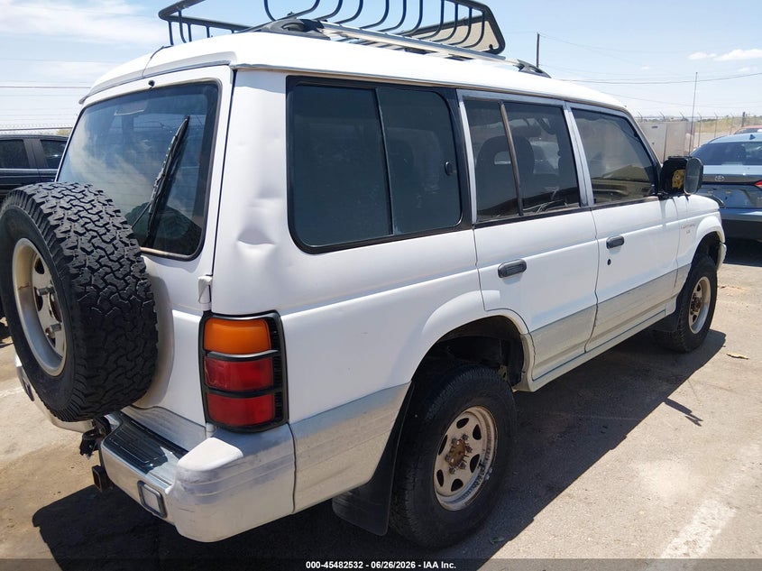 1995 Mitsubishi Montero VIN JA4MR41H8SJ013251 IAAI salvage auction — NORMAL WEAR, Clear (New Mexico), sold $675 on 2026-07-08 (photo 4)