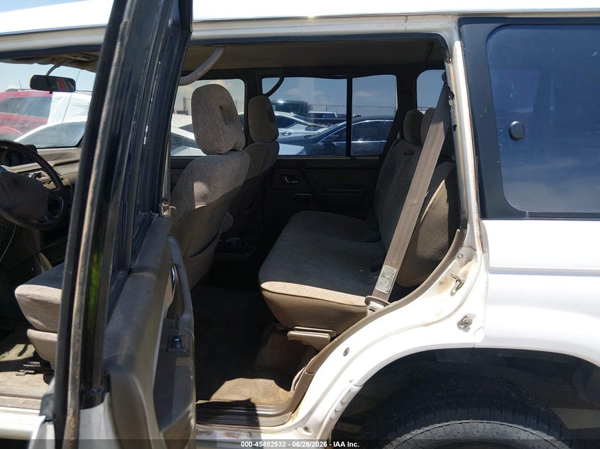 1995 Mitsubishi Montero VIN JA4MR41H8SJ013251 IAAI salvage auction — NORMAL WEAR, Clear (New Mexico), sold $675 on 2026-07-08 (photo 8)