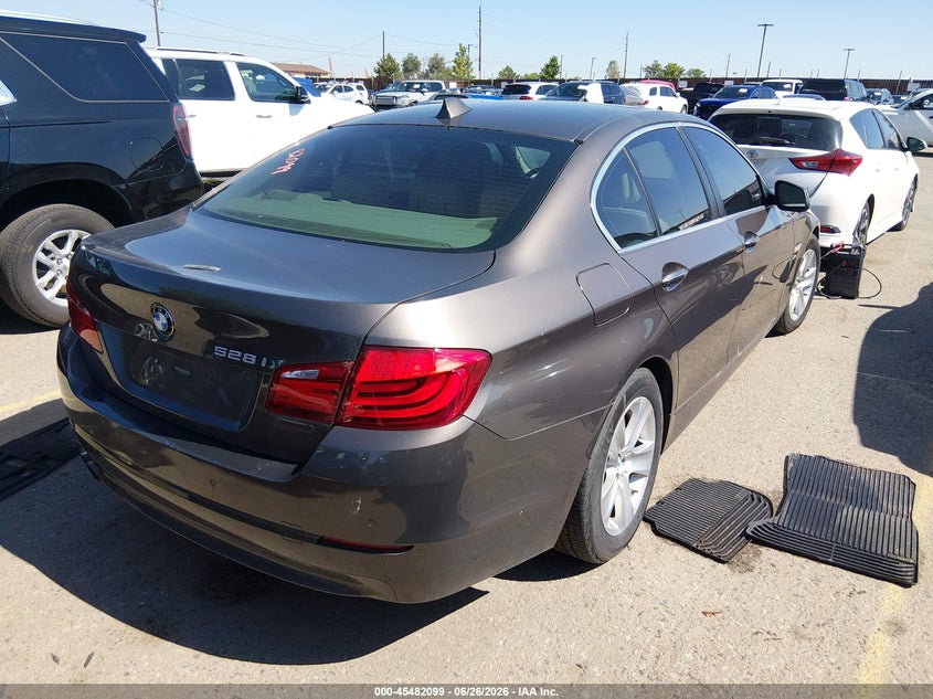 2012 BMW 5er VIN WBAXH5C59CDW10095 IAAI salvage auction — NORMAL WEAR, Clear (Colorado), sold $800 on 2026-07-07 (photo 4)
