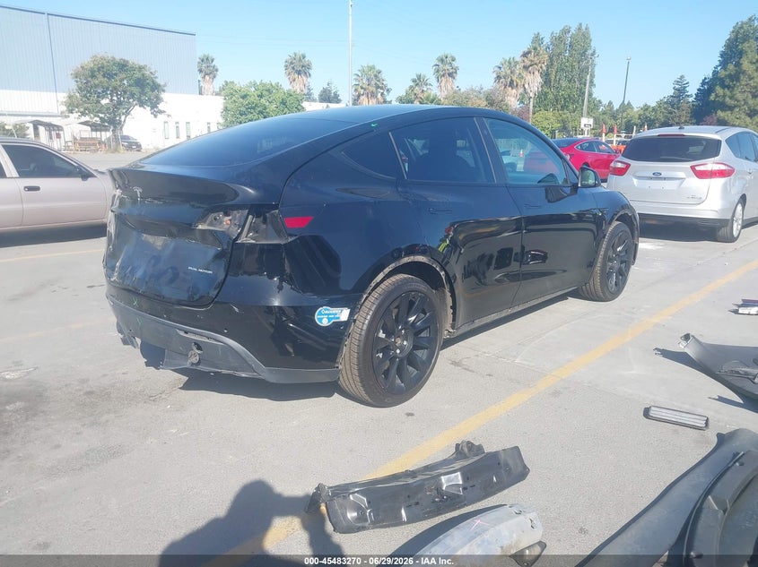 2021 Tesla Model y VIN 5YJYGDEE7MF076557 IAAI salvage auction — REAR END, Salvage (California), sold $8,100 on 2026-07-20 (photo 4)