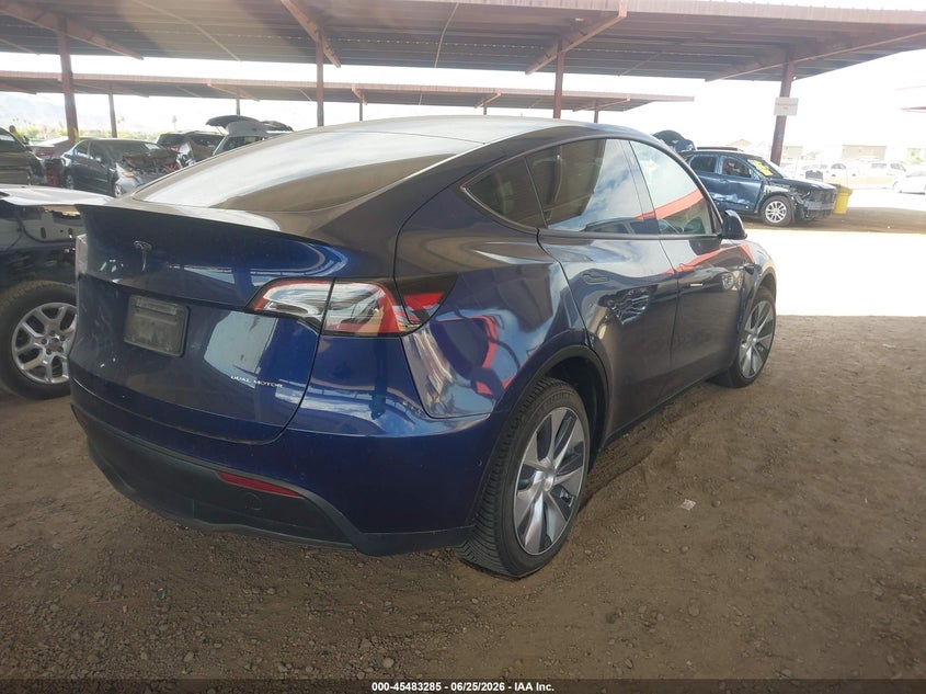 2022 Tesla Model y VIN 7SAYGDEE7NF369556 IAAI salvage auction — UNKNOWN, Restored (Arizona), sold $15,300 on 2026-07-14 (photo 4)