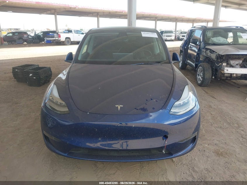 2022 Tesla Model y VIN 7SAYGDEE7NF369556 IAAI salvage auction — UNKNOWN, Restored (Arizona), sold $15,300 on 2026-07-14 (photo 6)