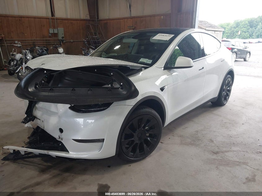 2023 Tesla Model y VIN 7SAYGDEE2PF792211 IAAI salvage auction — FRONT END, Salvage Title, sold $9,750 on 2026-08-27 (photo 2)