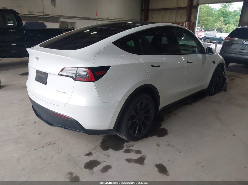 2023 Tesla Model y VIN 7SAYGDEE2PF792211 IAAI salvage auction — FRONT END, Salvage Title, sold $9,750 on 2026-08-27 (photo 4)