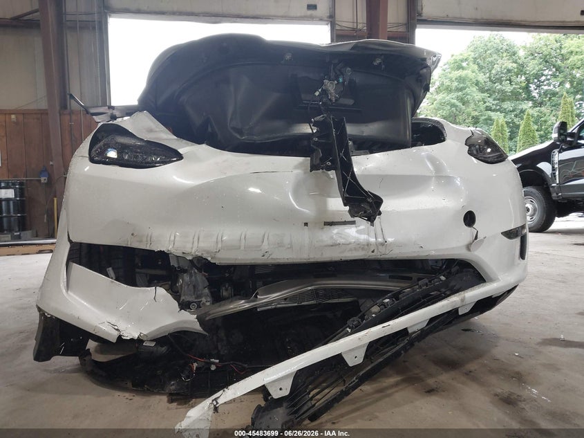 2023 Tesla Model y VIN 7SAYGDEE2PF792211 IAAI salvage auction — FRONT END, Salvage Title, sold $9,750 on 2026-08-27 (photo 6)