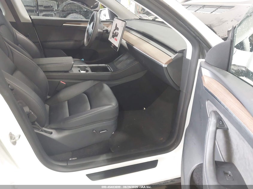 2023 Tesla Model y VIN 7SAYGDEE2PF792211 IAAI salvage auction — FRONT END, Salvage Title, sold $9,750 on 2026-08-27 (photo 5)