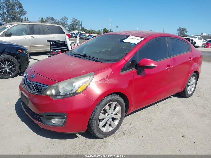 2013 Kia Rio VIN KNADN4A3XD6099672 IAAI salvage auction — UNKNOWN, Clear - Dealer Only (California), sold $675 on 2026-07-22 (photo 2)