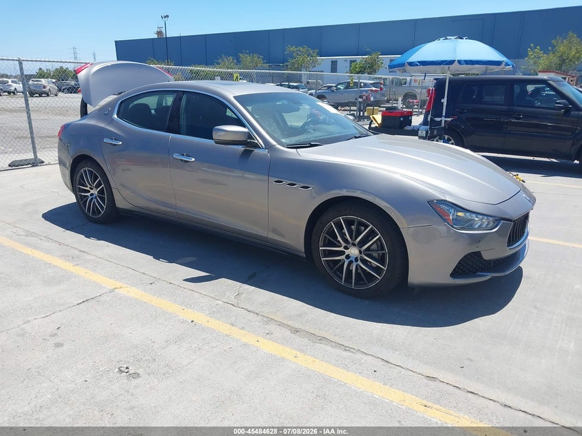2016 Maserati Ghibli VIN ZAM57XSA4G1167039 IAAI salvage auction — REAR END, Salvage Title, sold $6,950 on 2026-08-03 (photo 1)