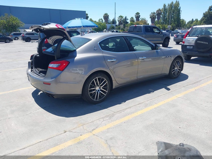 2016 Maserati Ghibli VIN ZAM57XSA4G1167039 IAAI salvage auction — REAR END, Salvage Title, sold $6,950 on 2026-08-03 (photo 4)
